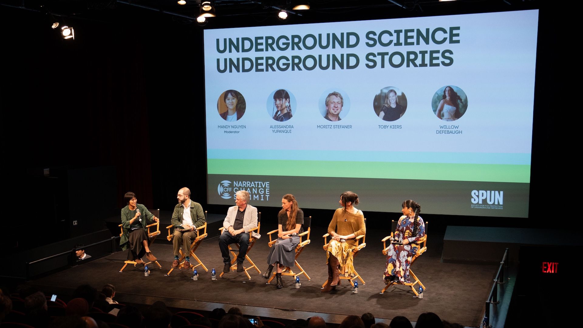 Six panelists in director's chairs on the SVA Theatre stage beneath a slide reading "Underground Science, Underground Stories" with speaker portraits and the SPUN and Narrative Change Summit logos