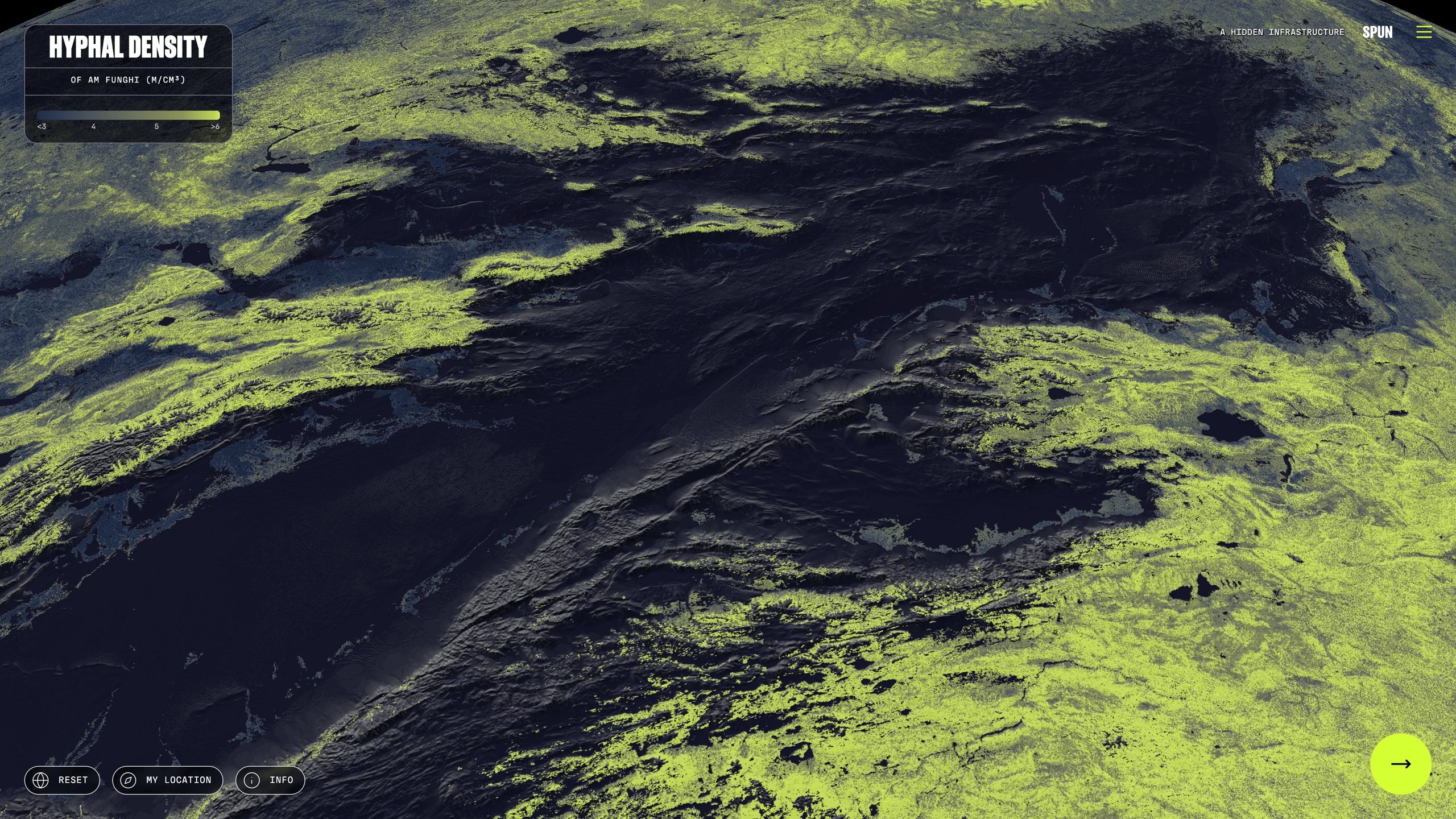 Close-up globe view of glowing green hyphal density mapped over mountainous terrain